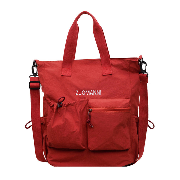 Tote bag with multifunctional outer pockets and adjustable shoulder strap Bowlift