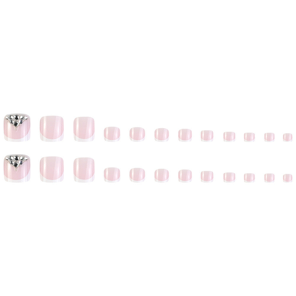 Nail art set with elegant French tips and sparkling rhinestone details Bowlift