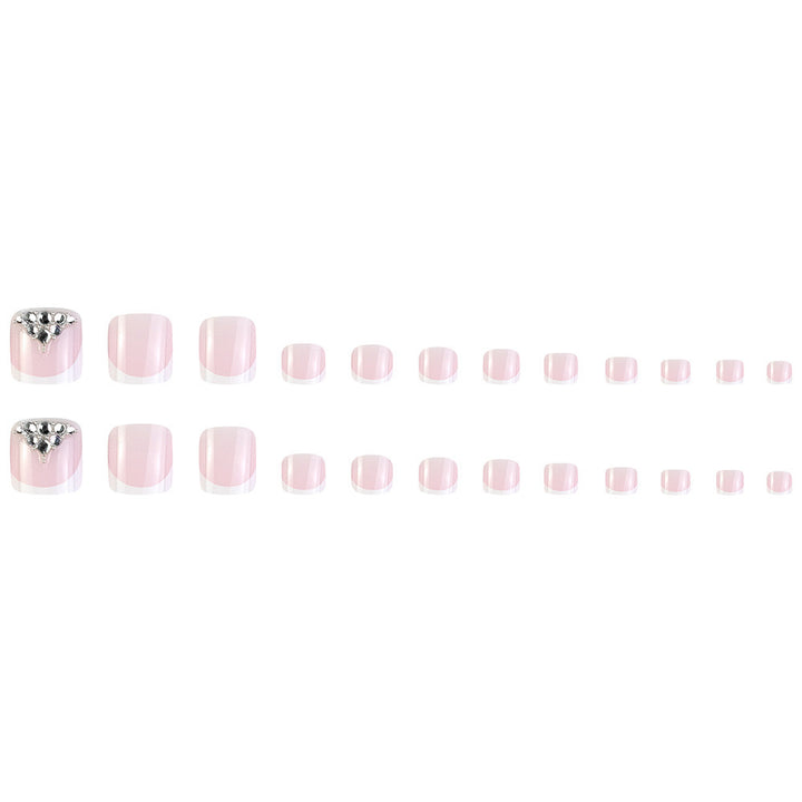 Nail art set with elegant French tips and sparkling rhinestone details Bowlift