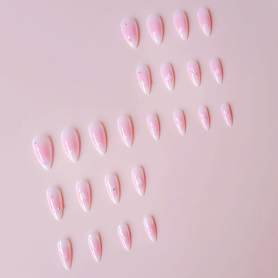 Artificial nail set with romantic heart design and embellished accents Bowlift