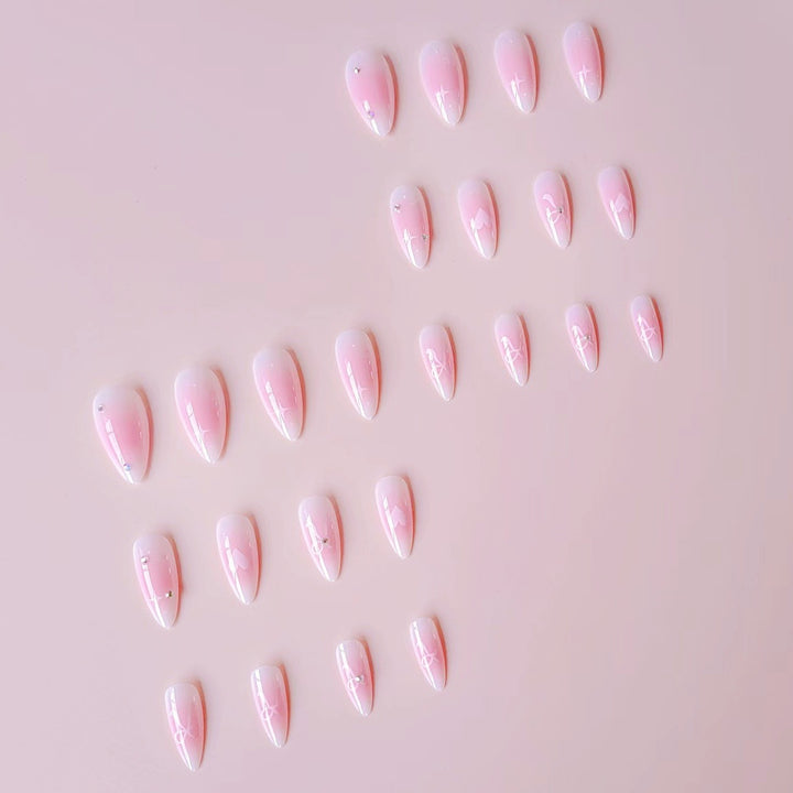 Artificial nail set with romantic heart design and embellished accents Bowlift