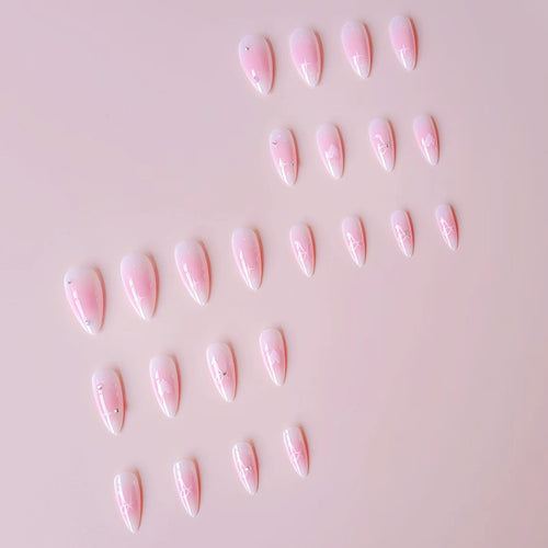 Artificial nail set with romantic heart design and embellished accents Bowlift