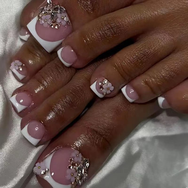 Acrylic nail set with elegant 3D flowers and glitter accents Bowlift