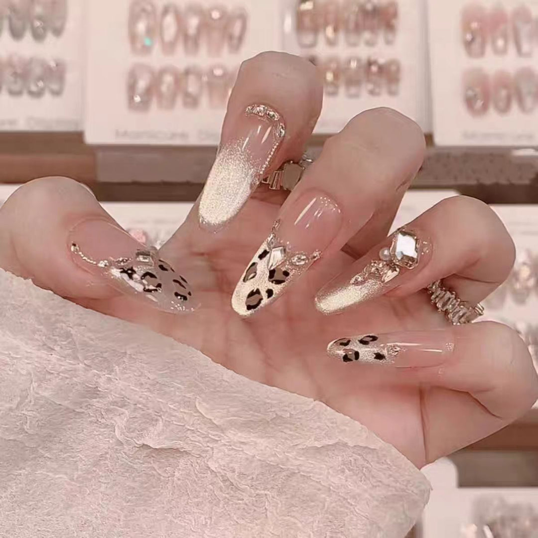 Glamorous artificial nails with creative 3D applications Bowlift