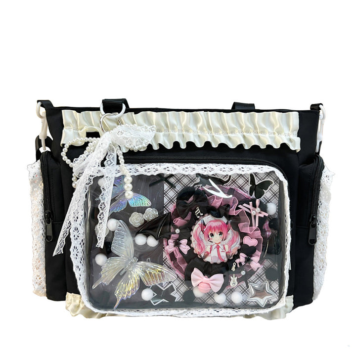 Shoulder bag with transparent front and playful applications Bowlift