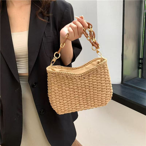 Handbag with chain carry handle Bowlift
