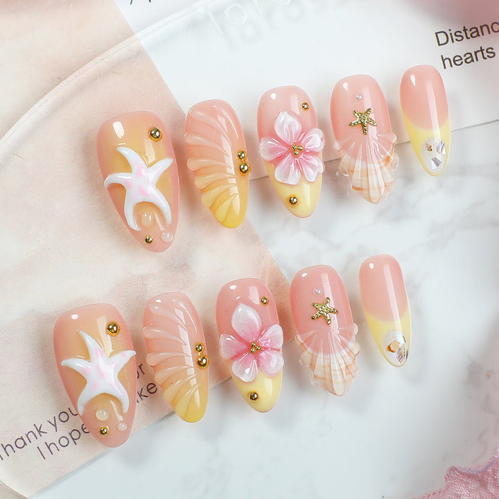 Creative nail art set with maritime motifs and elegant embellishments Bowlift