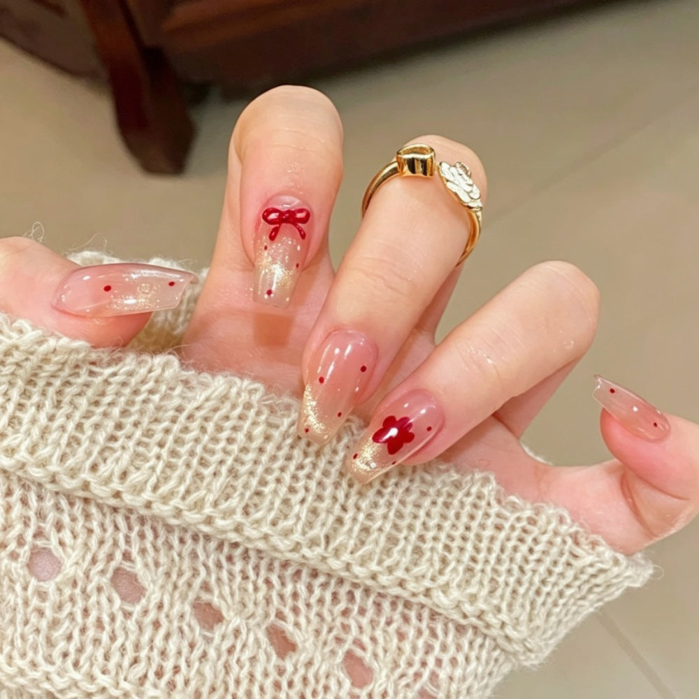 Artificial nails with sparkling accents and delicate patterns Bowlift