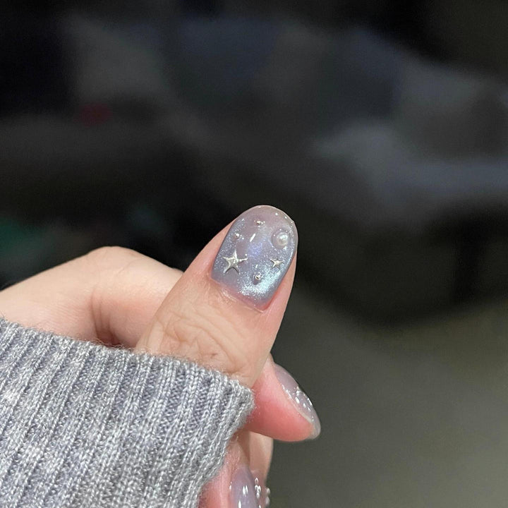 Artificial nails with shimmering star design Bowlift