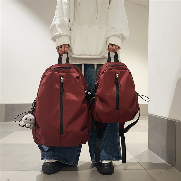 Backpack with Charming Animal Pendant and Innovative Storage Bowlift
