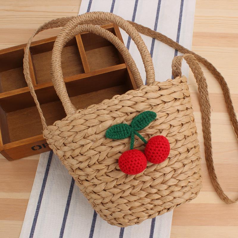 Basket bag with crocheted cherry design Bowlift