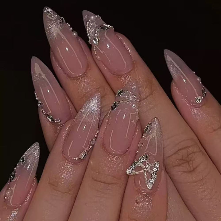 Artistic Stiletto Nail Extensions with Rhinestone Accents Bowlift