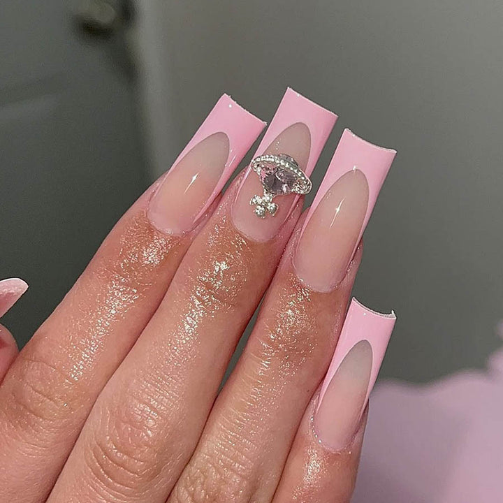 Acrylic nail set with luxurious floral and rhinestone decorations Bowlift