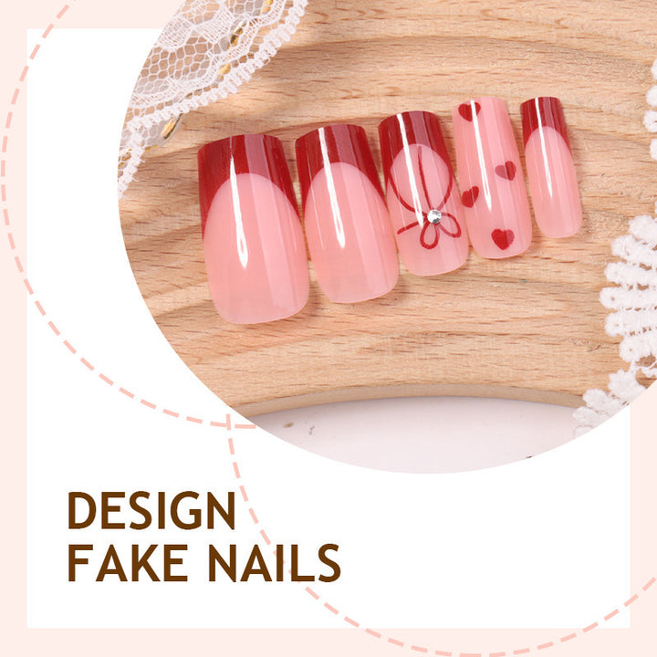 Artificial nail set with romantic hearts and elegant bows Bowlift