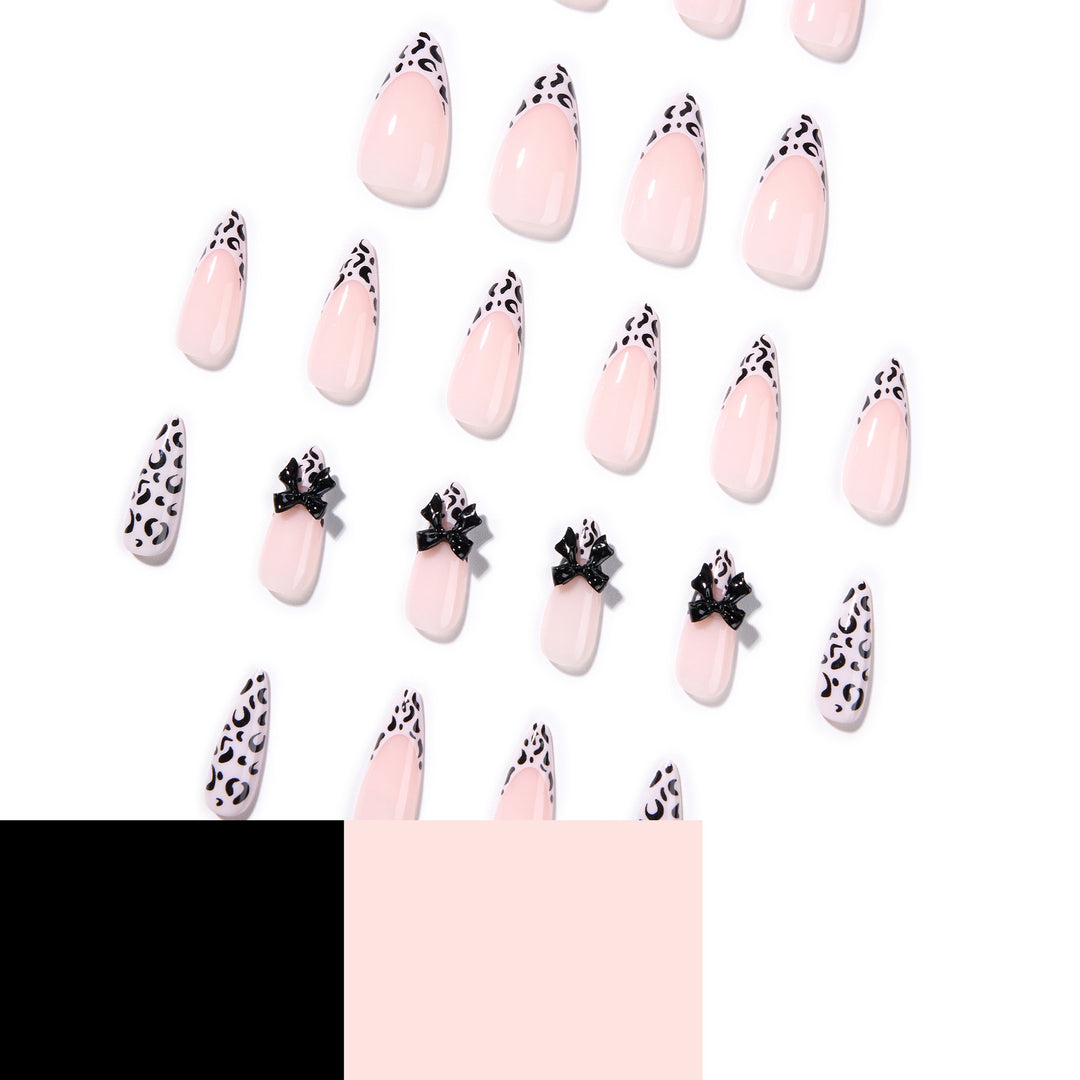 Artful Stiletto Nails with Leopard Print and Bow Accent Bowlift