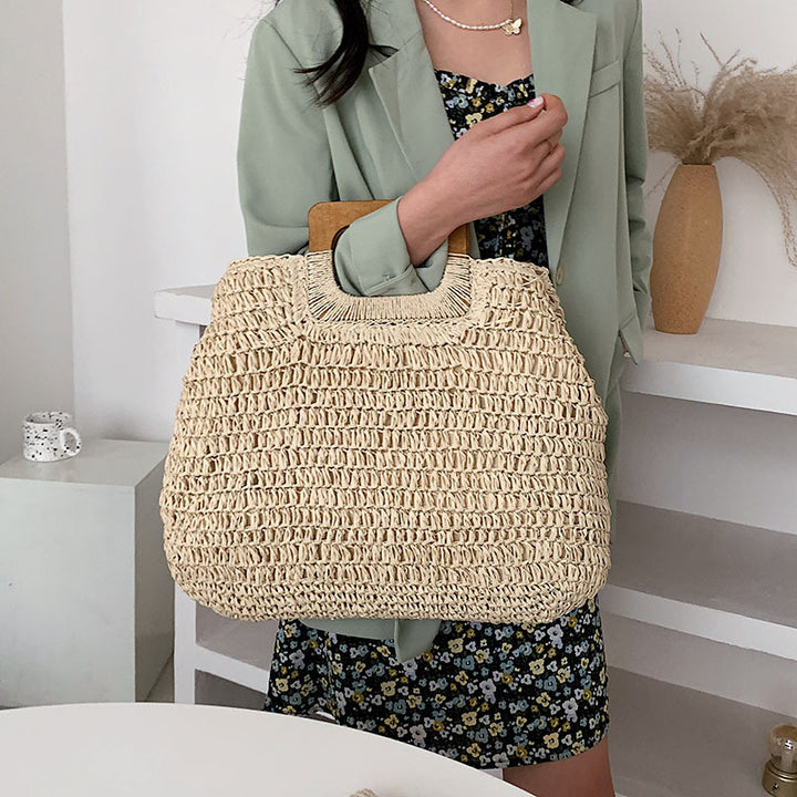 Designer handbag with practical wooden handle Bowlift