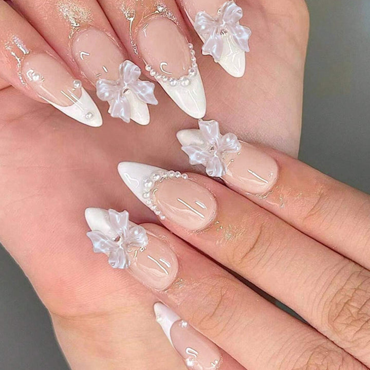 Artificial nail set with elegant bows and pearl decorations Bowlift
