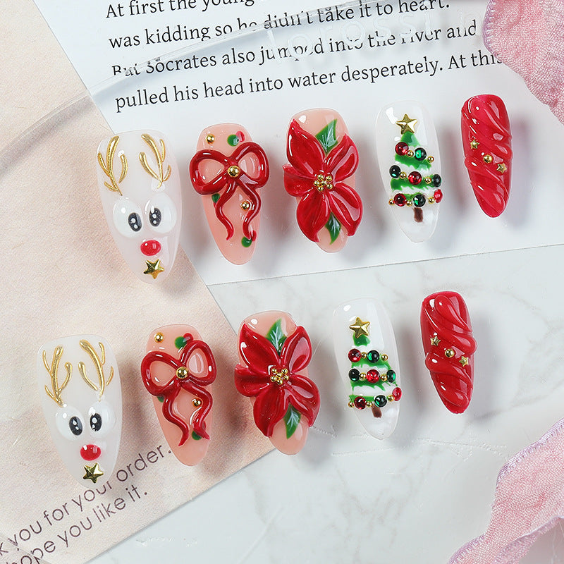 Creative Christmas Art Nail Set with Festive Designs and Glitter Accents Bowlift