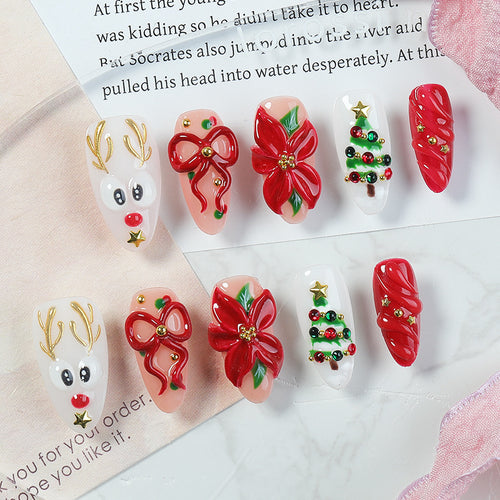 Creative Christmas Art Nail Set with Festive Designs and Glitter Accents Bowlift