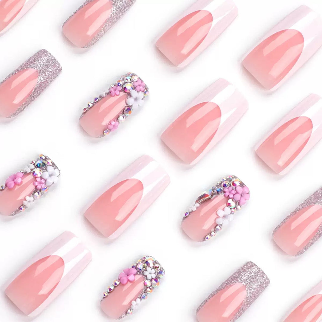 Artificial nail set with elegant 3D flowers and glitter embellishments Bowlift