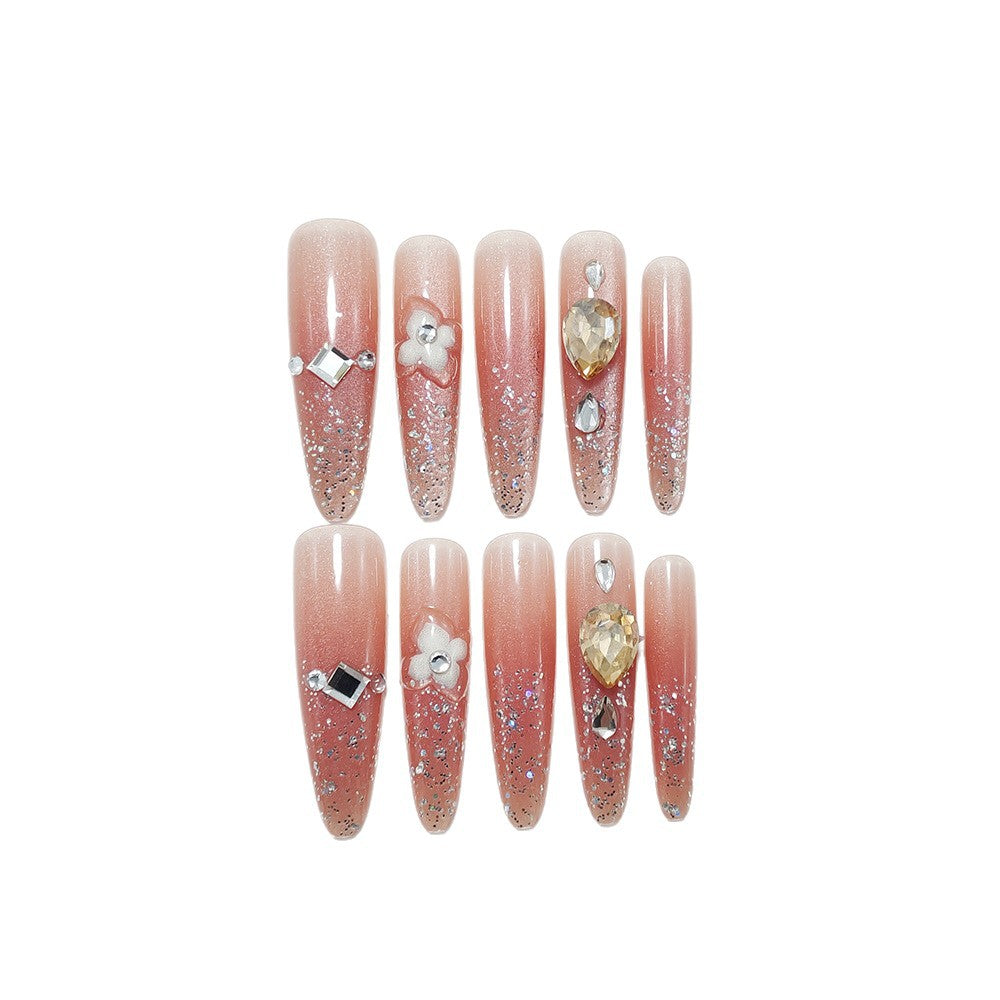 Shiny artificial nails with rhinestones and glitter Bowlift
