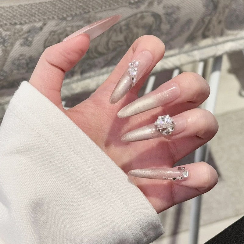 Artificial nail set with elegant tips and crystal accents Bowlift