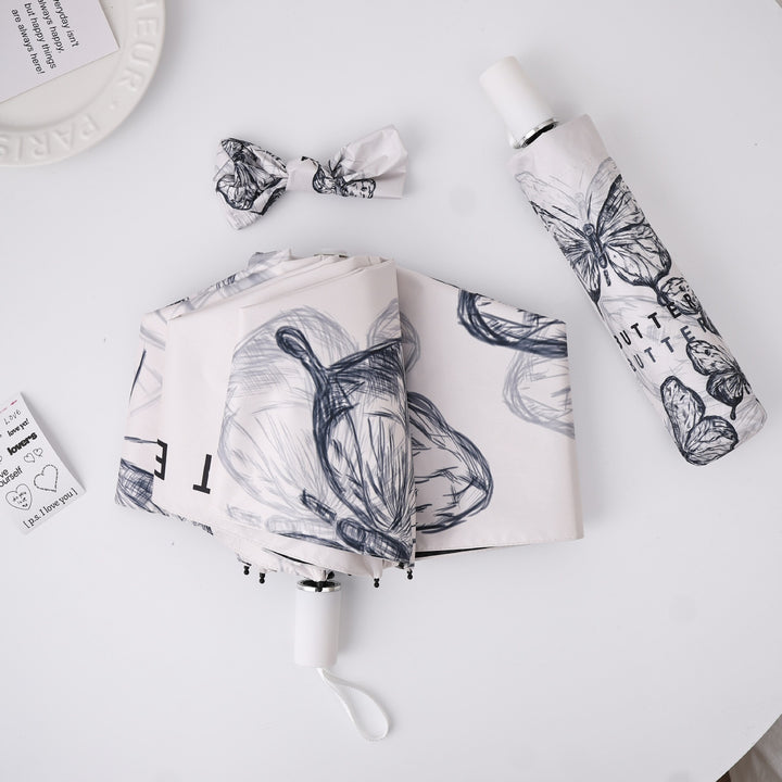 Ladies innovative folding umbrella with gentle leaf design and practical carrying pouch Bowlift