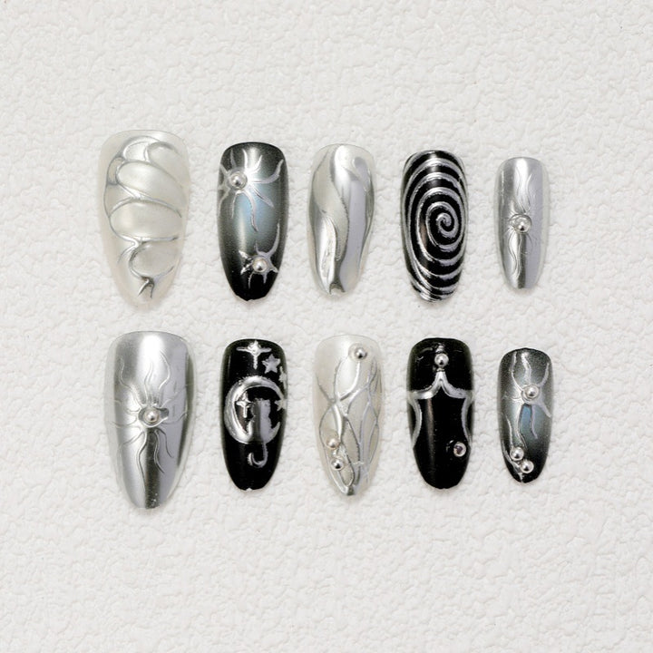 Artificial nails with metallic effects and complex designs Bowlift
