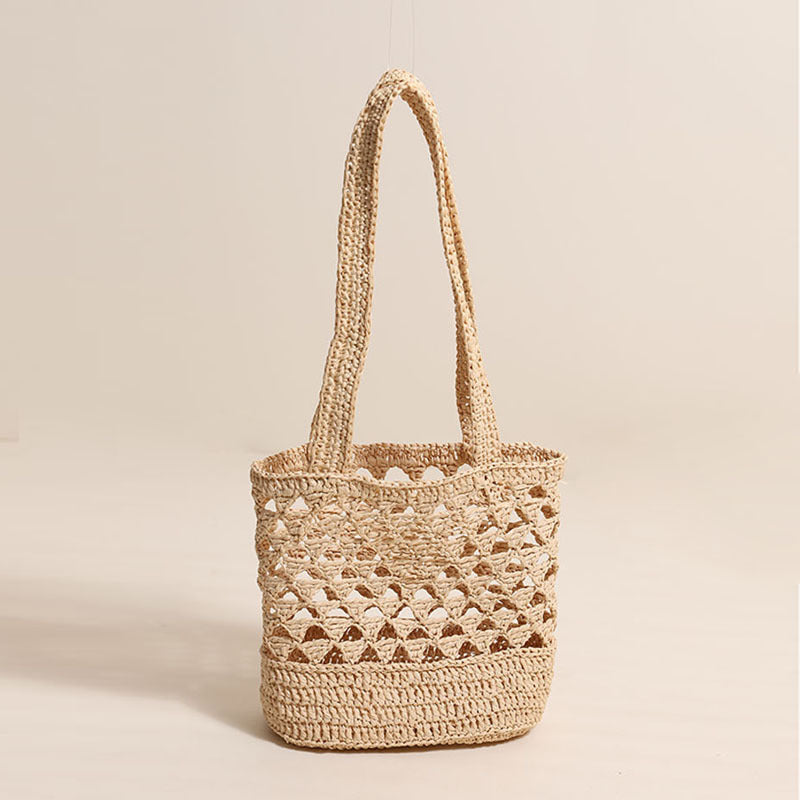 Handcrafted net straw bag with elegant straps Bowlift