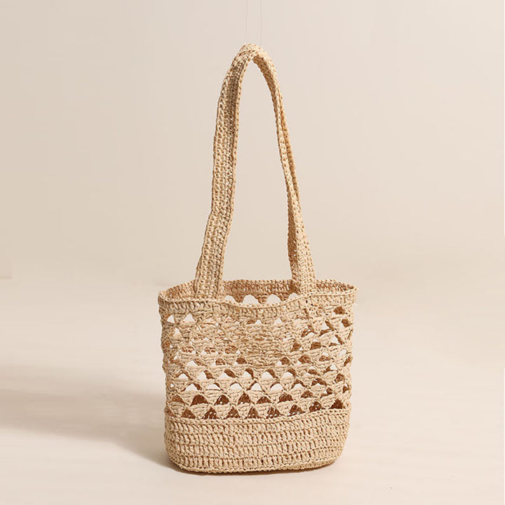 Handcrafted net straw bag with elegant straps Bowlift