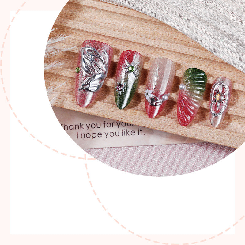 Artificial nail set with floral and festive decorations Bowlift
