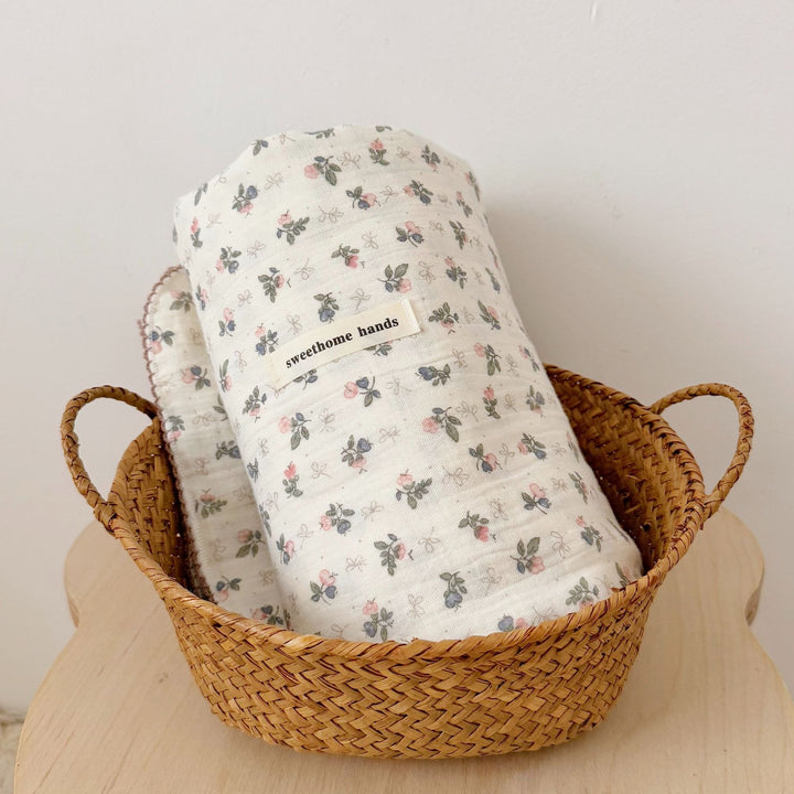 Unisex Muslin Blanket with delicate floral design and elegant ruffles Bowlift