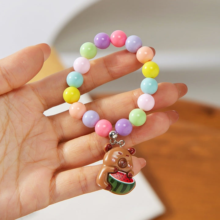 Colorful children's bracelet with crafted pendant Bowlift