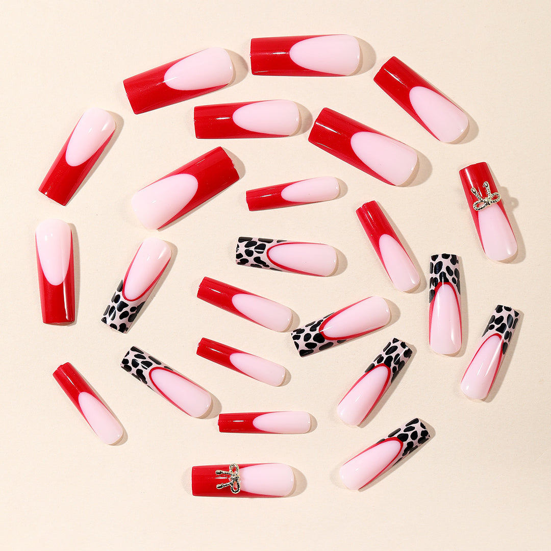 Stylish Acrylic Nail Extensions with Bow and Leopard Print Bowlift