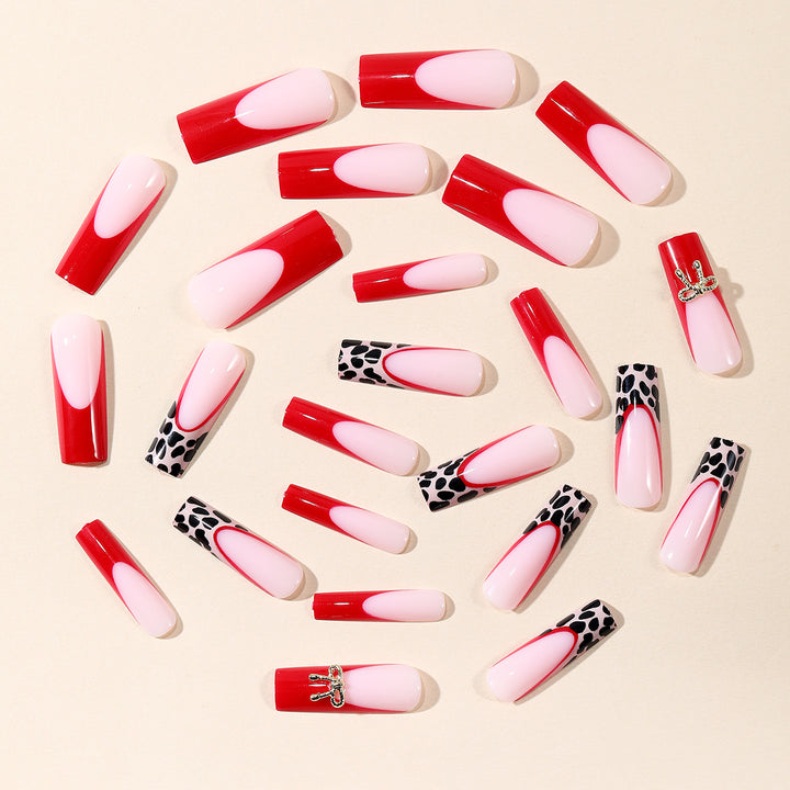 Stylish Acrylic Nail Extensions with Bow and Leopard Print Bowlift