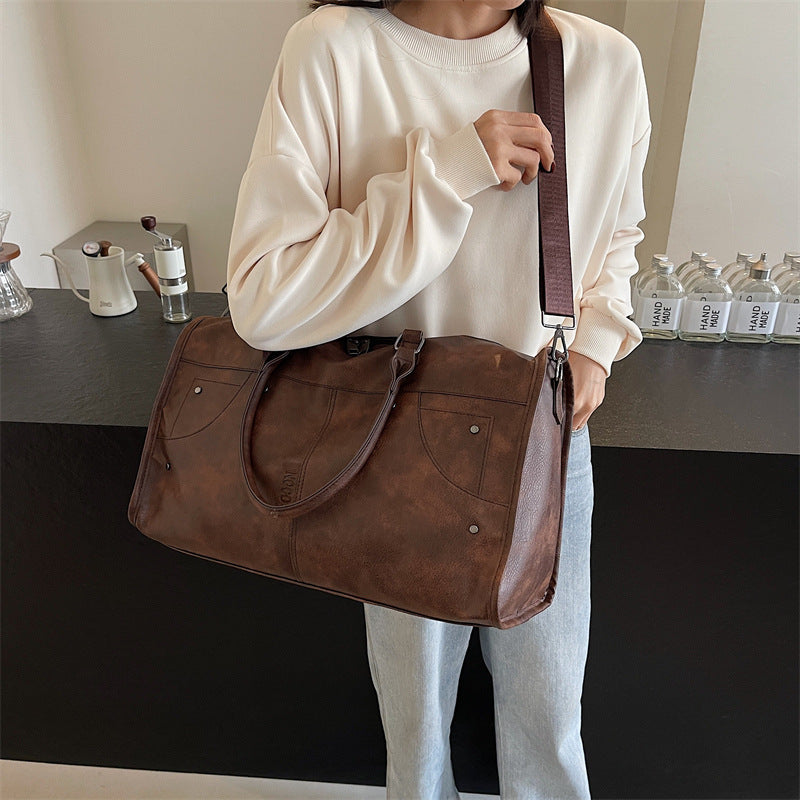 Elegant and Spacious Travel Bag Made of Durable Faux Leather Bowlift