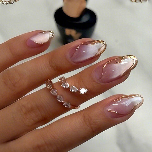 Acrylic nail set with glamorous gradient and golden accents Bowlift