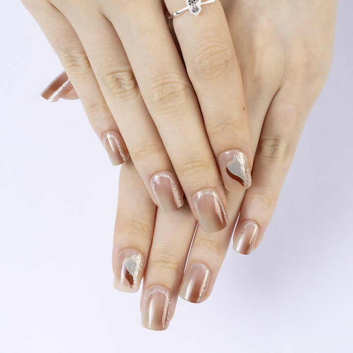Elegant Nail Art with Glitter and Stylish Accents Bowlift