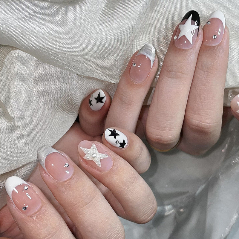 Artistic Press-On Nail Set with Star and Pearl Accents Bowlift