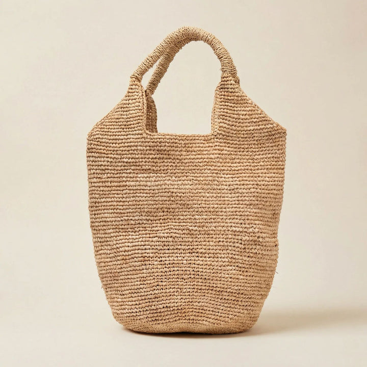 Beach bag made of natural raffia with practical handles Bowlift