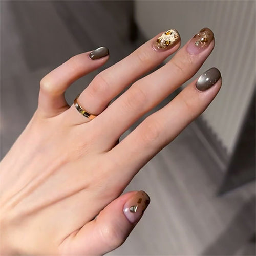Artistic nail art with glitter accents and elegant design Bowlift