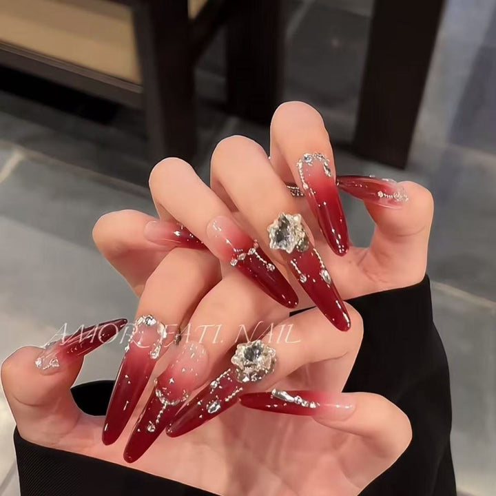 Glamorous artificial nail tips with elegant decorations Bowlift