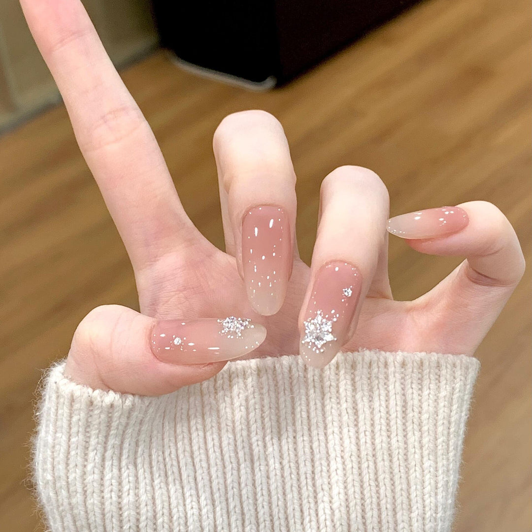 Artificial nails with shimmering effect and elegant star motif Bowlift