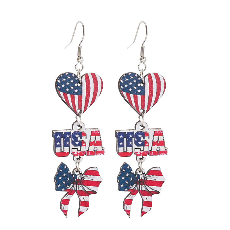 Women take statement earrings with cowboy hat heart and bow pendant Bowlift