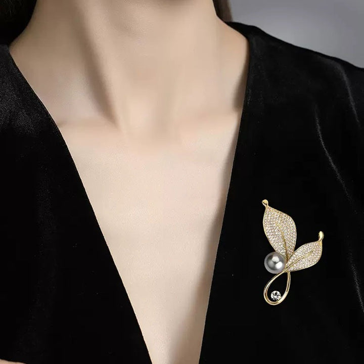 Elegant and Glamorous Brooch with Pearls and Crystals Bowlift