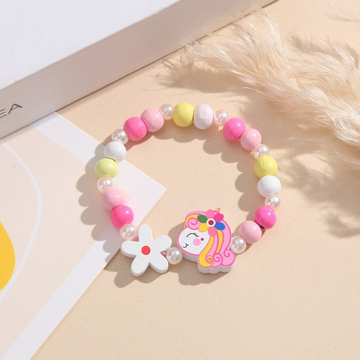 Playful children's bracelet with unicorn and flower motif Bowlift