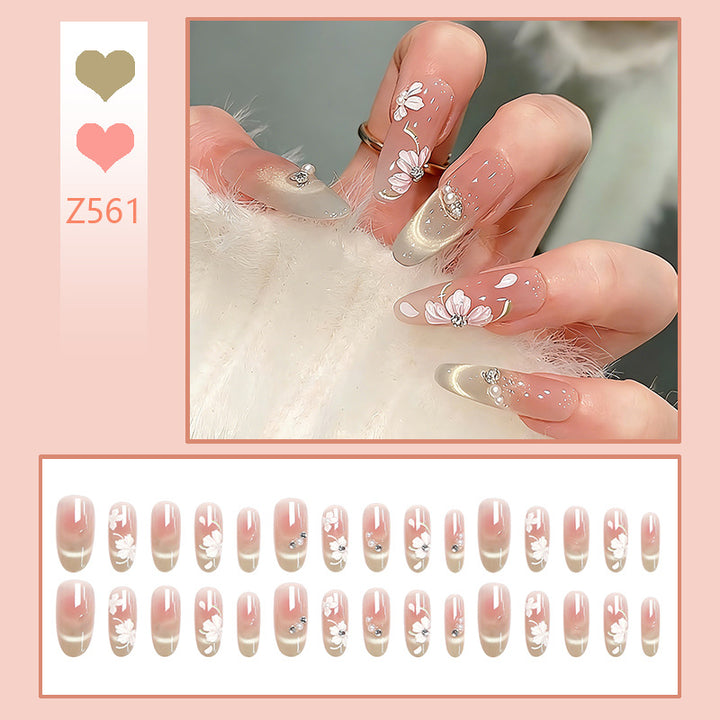 Artificial nail set with elegant floral accents Bowlift