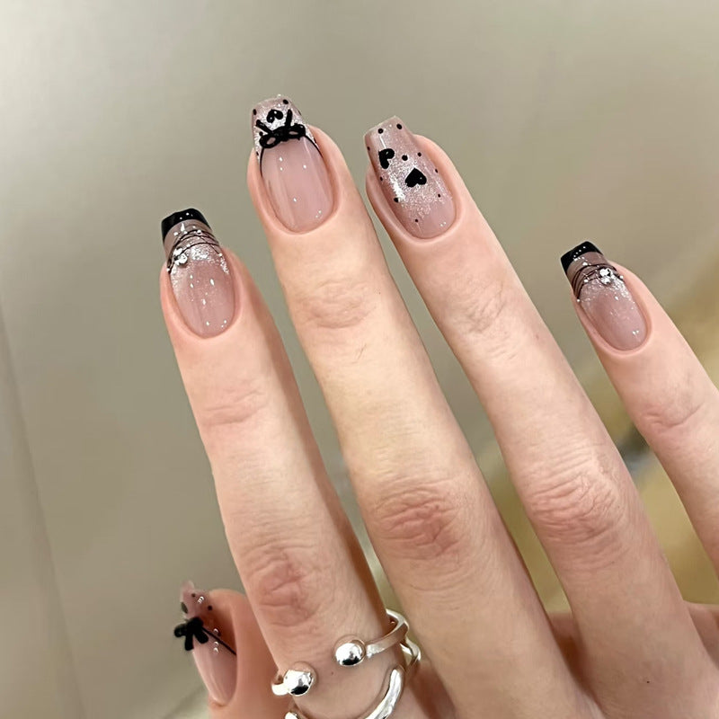 Elegant Artful Nail Design with Bow and Sparkle Accents Bowlift