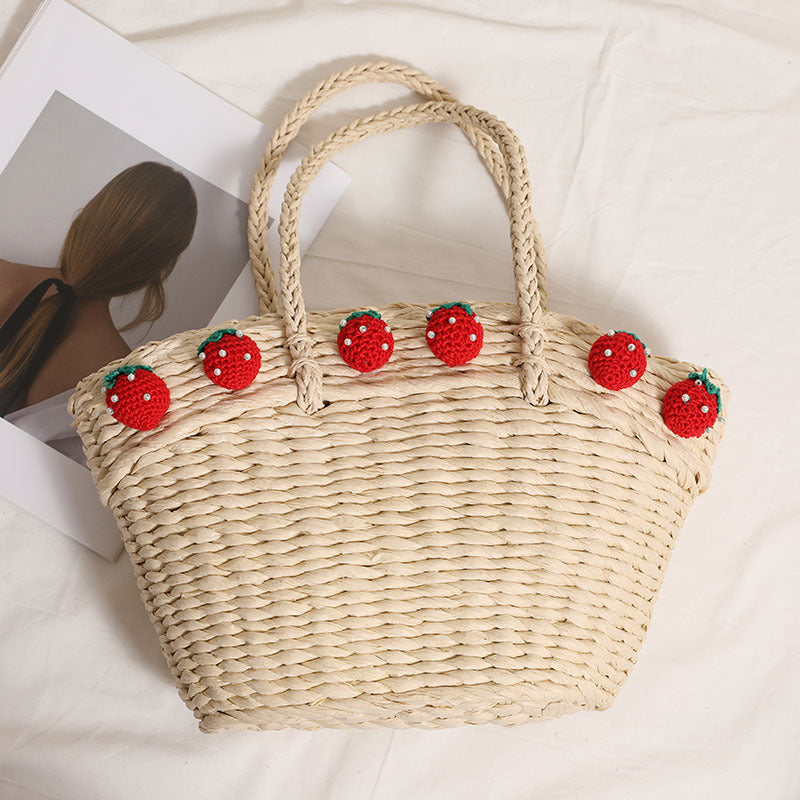 Handmade basket bag with playful strawberry motif Bowlift