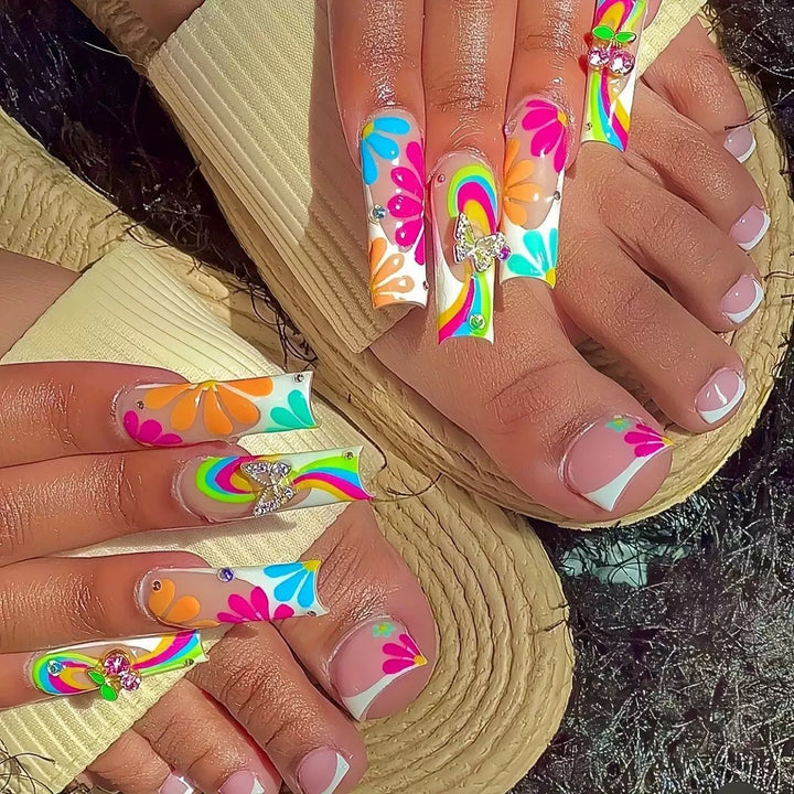 Nail art set with glowing flower motifs and glitter accents Bowlift